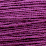 A close-up of tightly wound purple yarn or thread strands filling the frame.